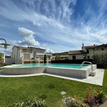 ApartmentsGarda - Corte dei Molini Esterno foto