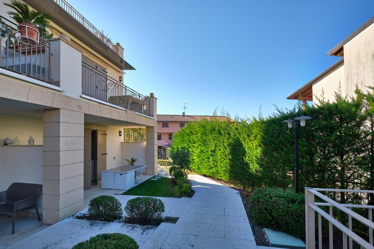 ApartmentsGarda - Corte dei Molini Esterno foto