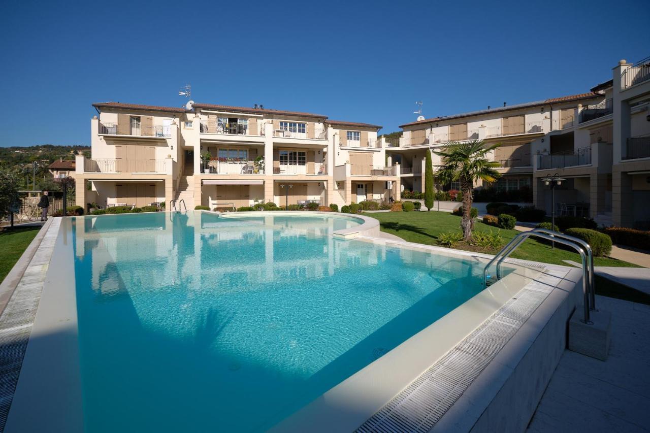 ApartmentsGarda - Corte dei Molini Esterno foto