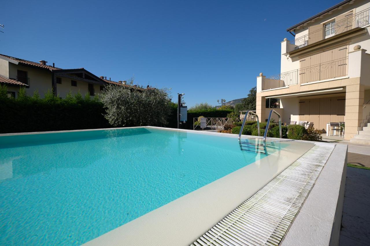 ApartmentsGarda - Corte dei Molini Esterno foto