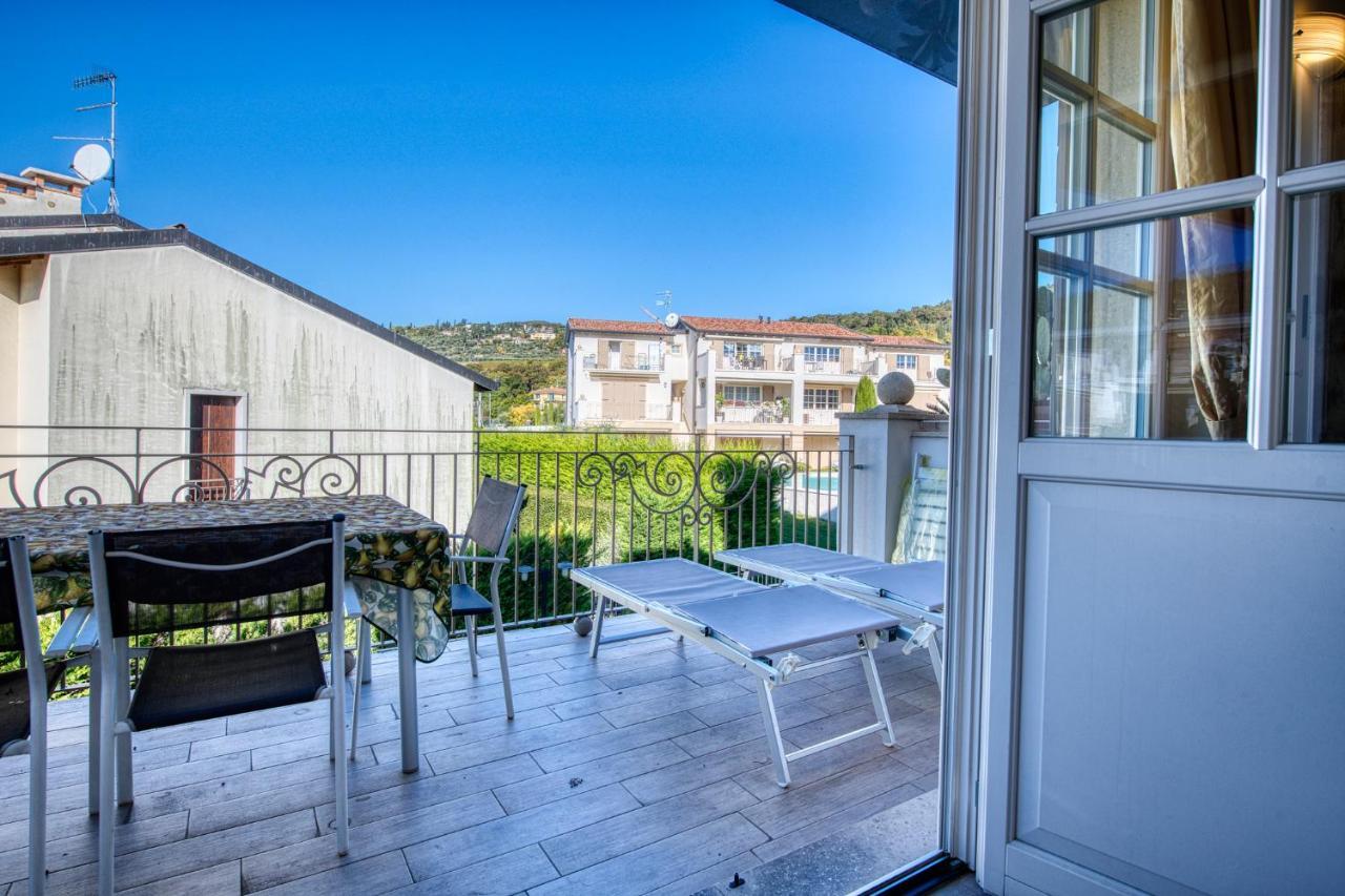 ApartmentsGarda - Corte dei Molini Esterno foto
