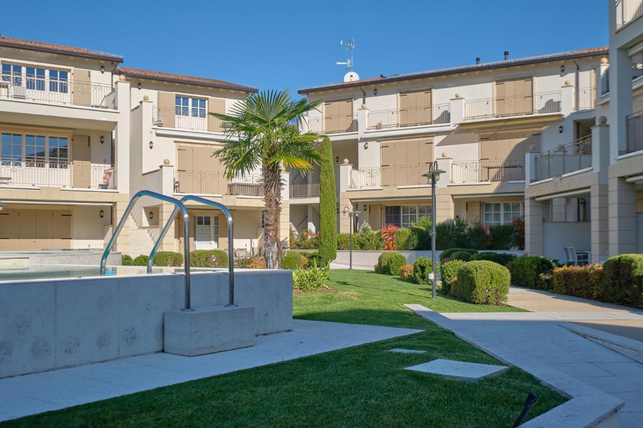 ApartmentsGarda - Corte dei Molini Esterno foto