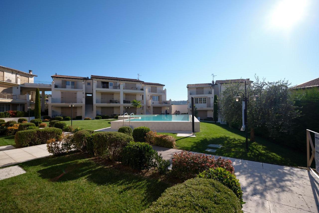 ApartmentsGarda - Corte dei Molini Esterno foto