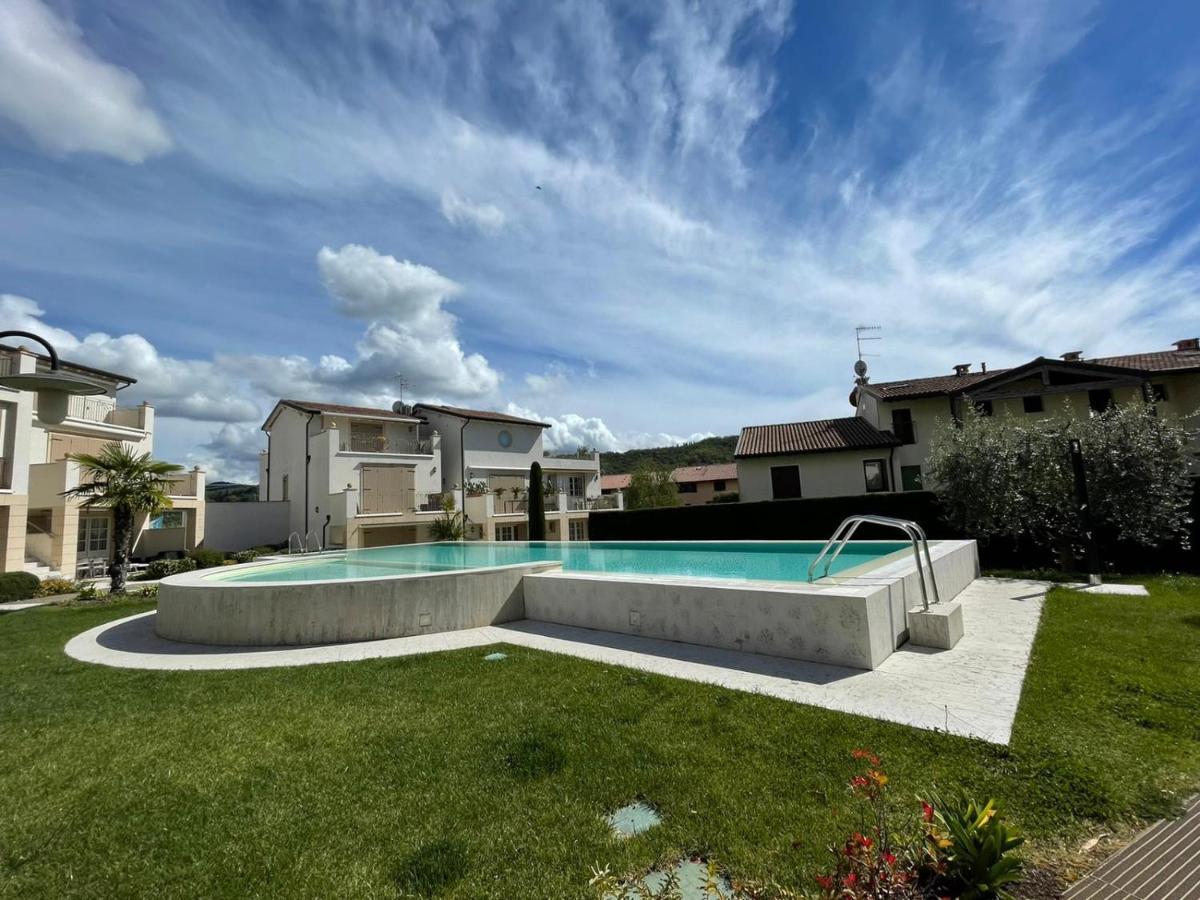 ApartmentsGarda - Corte dei Molini Esterno foto